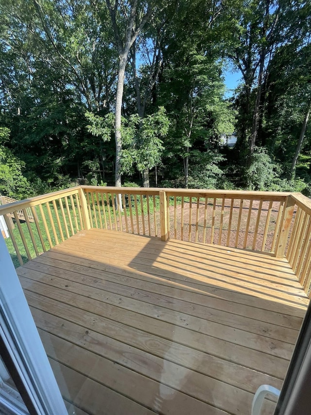 631 S Center St, Spartanburg, SC 29301 - wooden terrace featuring view of scattered trees