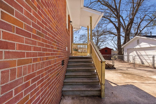 306 Fernwood Dr, Spartanburg, SC 29307 - view of property exterior featuring an outdoor structure, a gate, a detached garage, and brick siding