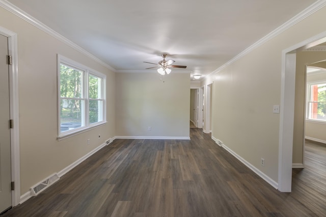 201 Bent Creek Dr, Greer, SC 29650 - spare room featuring dark wood finished floors, ceiling fan, crown molding, and arched walkways