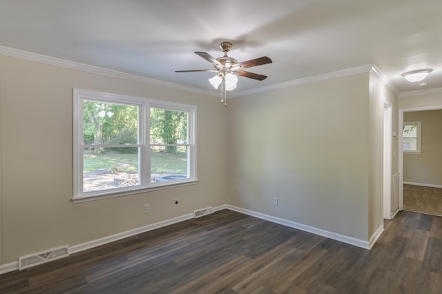 201 Bent Creek Dr, Greer, SC 29650 - spare room with dark wood finished floors, a ceiling fan, and ornamental molding