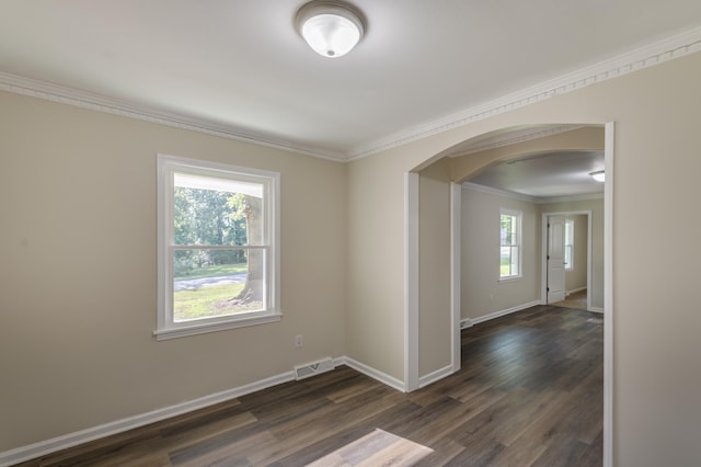 201 Bent Creek Dr, Greer, SC 29650 - unfurnished room with arched walkways, ornamental molding, and dark wood-style floors
