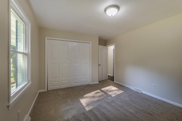 201 Bent Creek Dr, Greer, SC 29650 - unfurnished bedroom featuring carpet and a closet