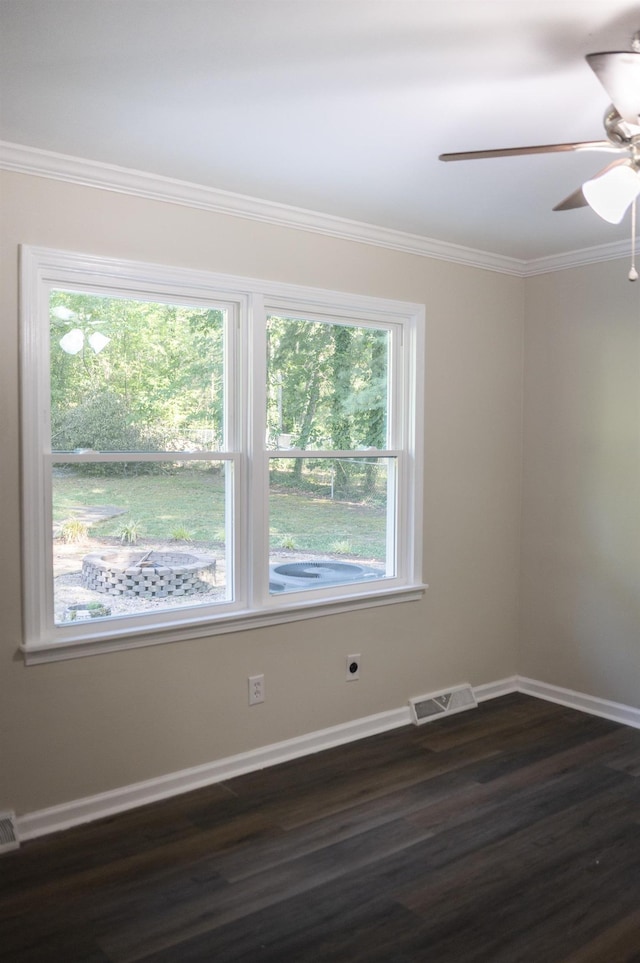 201 Bent Creek Dr, Greer, SC 29650 - empty room with dark wood finished floors, ceiling fan, and crown molding