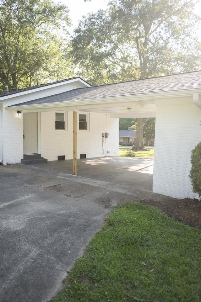 201 Bent Creek Dr, Greer, SC 29650 - garage featuring a carport and driveway