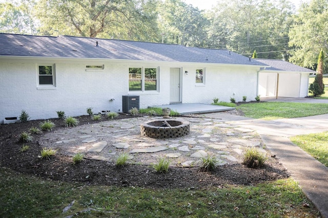 201 Bent Creek Dr, Greer, SC 29650 - back of house with an outdoor fire pit, brick siding, a patio area, and a shingled roof
