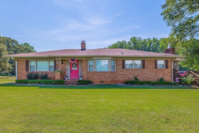 849 Harvey Rd, Greer, SC 29651 - ranch-style home featuring a chimney, a front lawn, and brick siding
