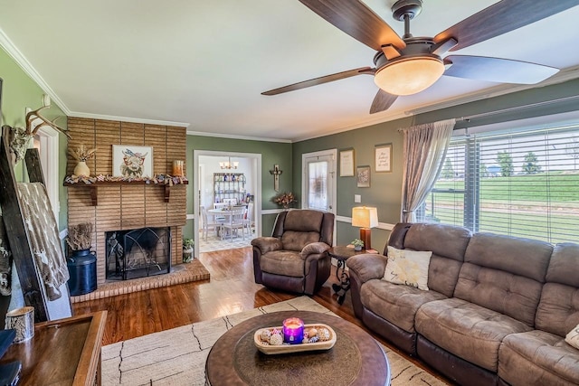 849 Harvey Rd, Greer, SC 29651 - living area featuring a ceiling fan, ornamental molding, wood finished floors, and a fireplace