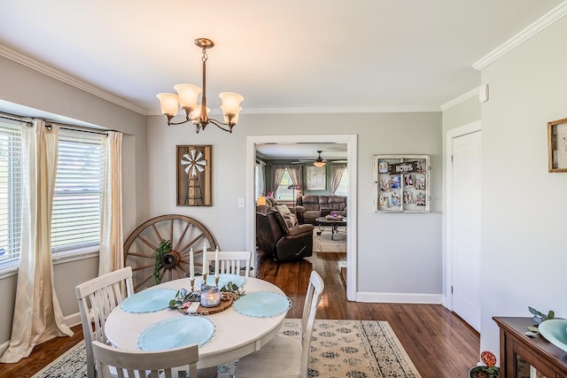 849 Harvey Rd, Greer, SC 29651 - dining room featuring crown molding, wood finished floors, a chandelier, and a ceiling fan