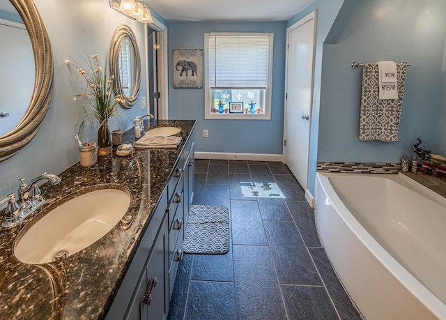 849 Harvey Rd, Greer, SC 29651 - bathroom featuring double vanity, a bath, and tile patterned flooring