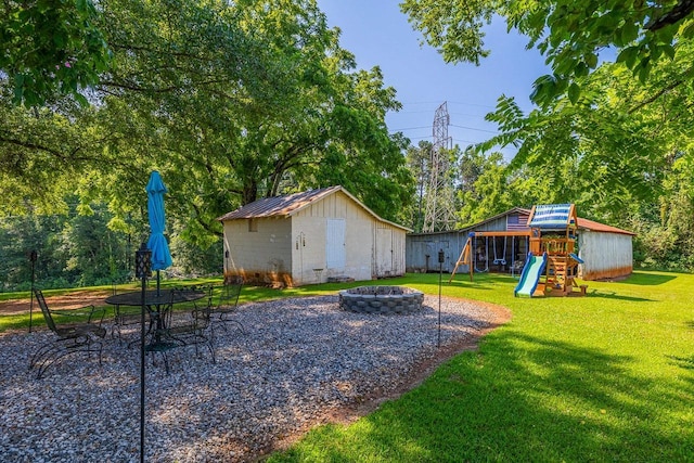 849 Harvey Rd, Greer, SC 29651 - view of yard with a fire pit, a playground, and a shed