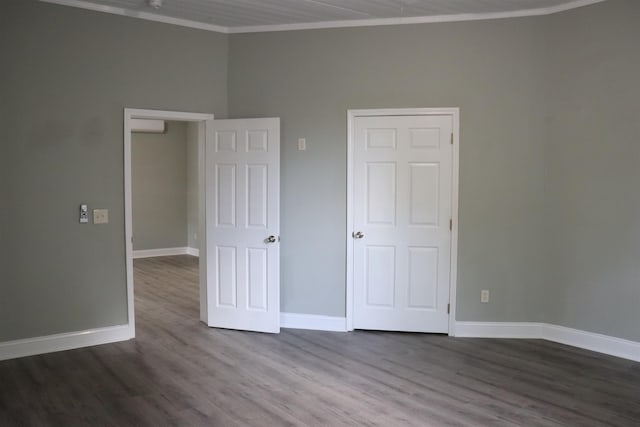 305 Spring St, Union, SC 29379 - unfurnished bedroom featuring wood finished floors and ornamental molding