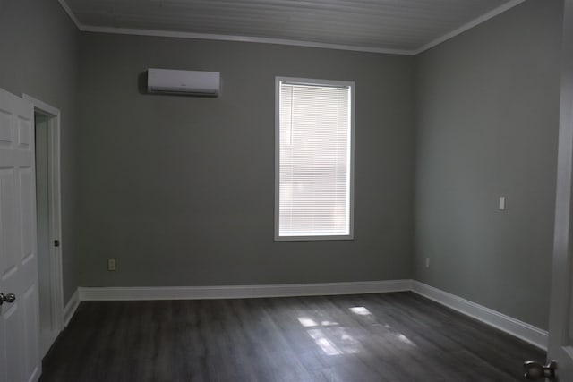 305 Spring St, Union, SC 29379 - unfurnished room featuring a wall mounted AC, dark wood-style flooring, and ornamental molding