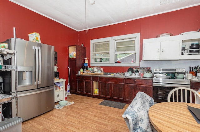 41 Chestnut St, Startex, SC 29377 - kitchen with stainless steel appliances, crown molding, and light wood-type flooring