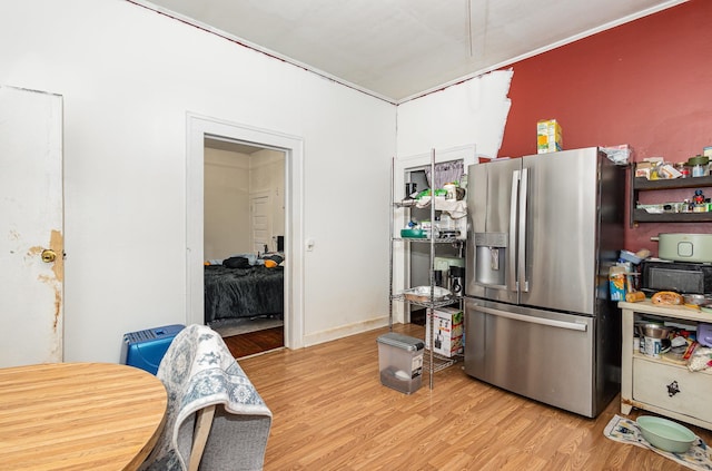 41 Chestnut St, Startex, SC 29377 - kitchen with stainless steel fridge and light wood-style floors