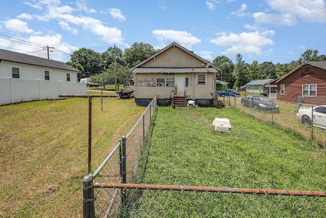 41 Chestnut St, Startex, SC 29377 - rear view of property featuring a fenced backyard and entry steps