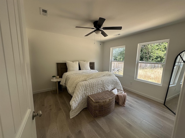 355 E Floyd Baker Blvd, Gaffney, SC 29340 - bedroom with wood finished floors and ceiling fan