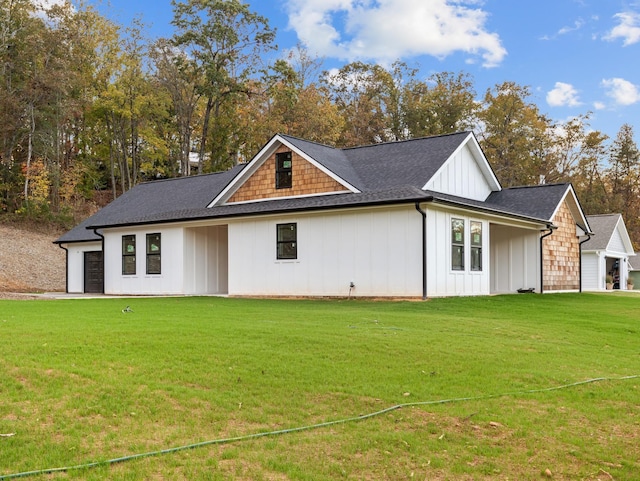 278 Forest Ave, Landrum, SC 29356 - view of front of property with board and batten siding, a front yard, and roof with shingles