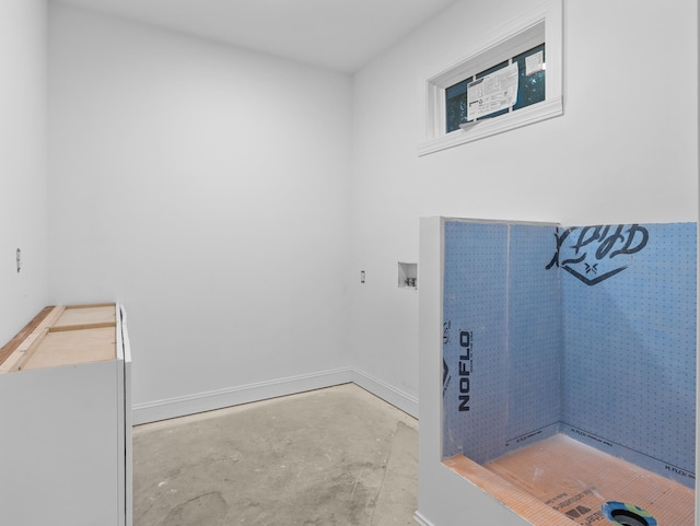 278 Forest Ave, Landrum, SC 29356 - bathroom with unfinished concrete flooring and baseboards