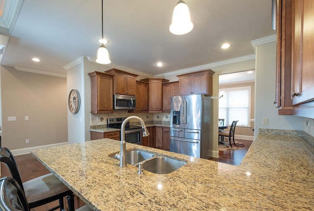 110 Coal Creek Dr, Boiling Springs, SC 29316 - kitchen with appliances with stainless steel finishes, dark wood finished floors, light stone counters, a peninsula, and decorative backsplash