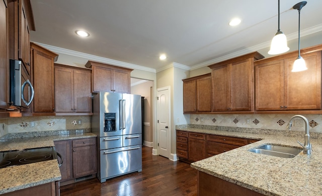 110 Coal Creek Dr, Boiling Springs, SC 29316 - kitchen with stainless steel appliances, dark wood-type flooring, light stone counters, pendant lighting, and ornamental molding