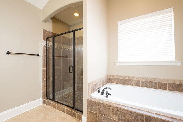 110 Coal Creek Dr, Boiling Springs, SC 29316 - full bath featuring a garden tub, a shower stall, and tile patterned floors
