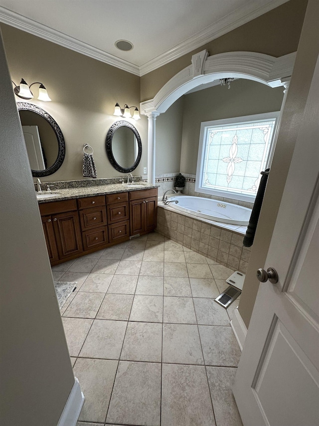 103 Welborn Oaks Way, Anderson, SC 29621 - full bath featuring decorative columns, ornamental molding, a bath, double vanity, and tile patterned flooring