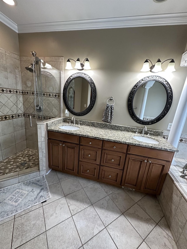 103 Welborn Oaks Way, Anderson, SC 29621 - bathroom featuring tiled shower, ornamental molding, double vanity, and tile patterned flooring