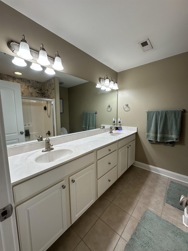 103 Welborn Oaks Way, Anderson, SC 29621 - bathroom with tile patterned flooring, double vanity, and a shower stall