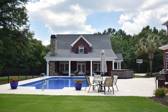 103 Welborn Oaks Way, Anderson, SC 29621 - view of swimming pool featuring a hot tub, french doors, and a patio area