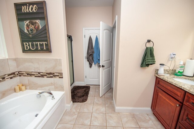 516 Abberly Ln, Boiling Springs, SC 29316 - bathroom featuring a jetted tub, vanity, tile patterned flooring, and a shower stall