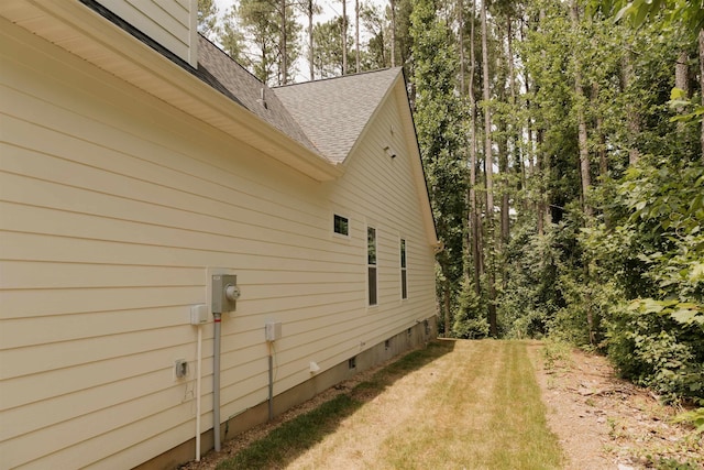 305 Meadow Tree Ct, Travelers Rest, SC 29690 - view of home's exterior featuring roof with shingles and a lawn