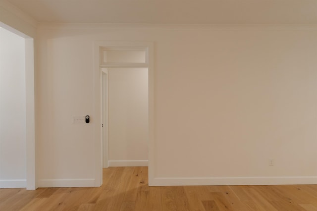 305 Meadow Tree Ct, Travelers Rest, SC 29690 - spare room featuring light wood-style flooring and crown molding