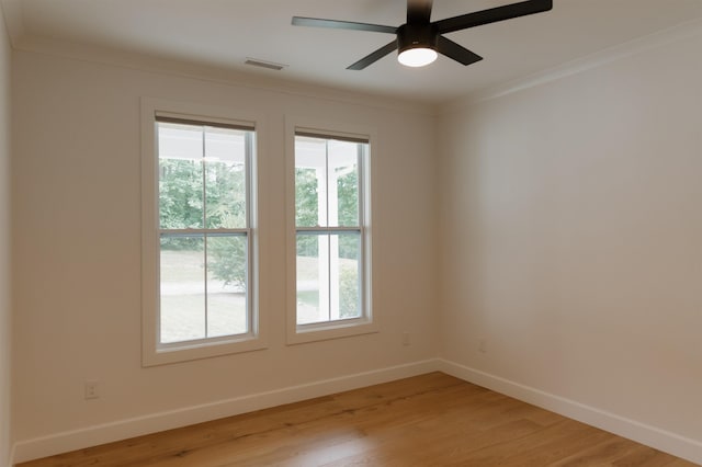 305 Meadow Tree Ct, Travelers Rest, SC 29690 - empty room featuring light wood-style floors, a ceiling fan, and crown molding