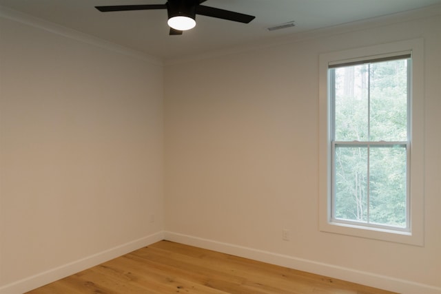 305 Meadow Tree Ct, Travelers Rest, SC 29690 - unfurnished room featuring ornamental molding, a ceiling fan, and light wood finished floors