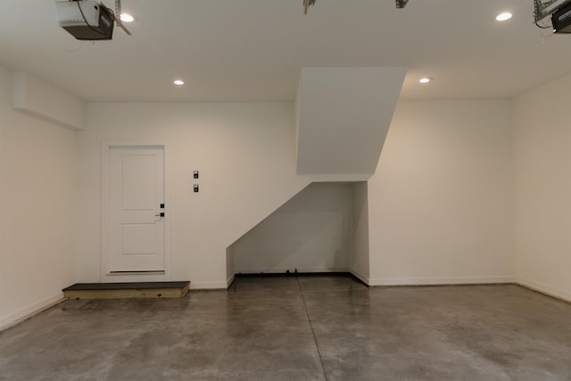 305 Meadow Tree Ct, Travelers Rest, SC 29690 - garage with a garage door opener and recessed lighting