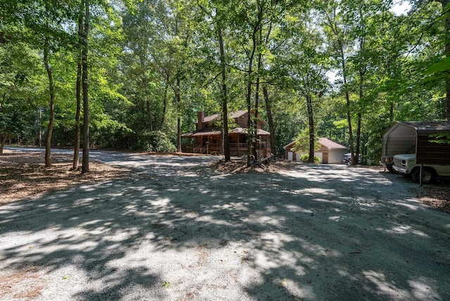 320 Whitfield Dr, Pendleton, SC 29670 - view of dirt / gravel road featuring a forest view