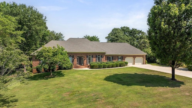 216 Antrim Ave, Moore, SC 29369 - view of front facade with driveway, an attached garage, a front lawn, and brick siding