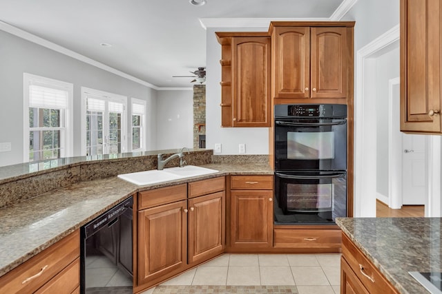 528 Carolee Way, Greer, SC 29651 - kitchen with black appliances, ornamental molding, brown cabinets, and dark stone counters