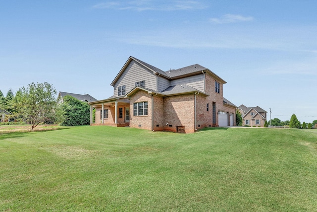 528 Carolee Way, Greer, SC 29651 - back of house featuring brick siding, a lawn, crawl space, and covered porch