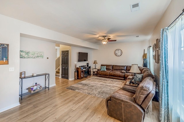 273 Bridgeport Rd, Boiling Springs, SC 29316 - living area with stairs, a ceiling fan, and light wood-type flooring