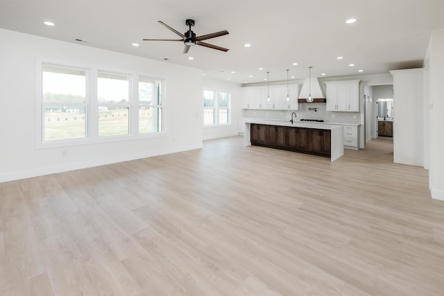 3619 Pennington Rd, Greer, SC 29651 - unfurnished living room featuring ceiling fan, recessed lighting, and light wood-style floors