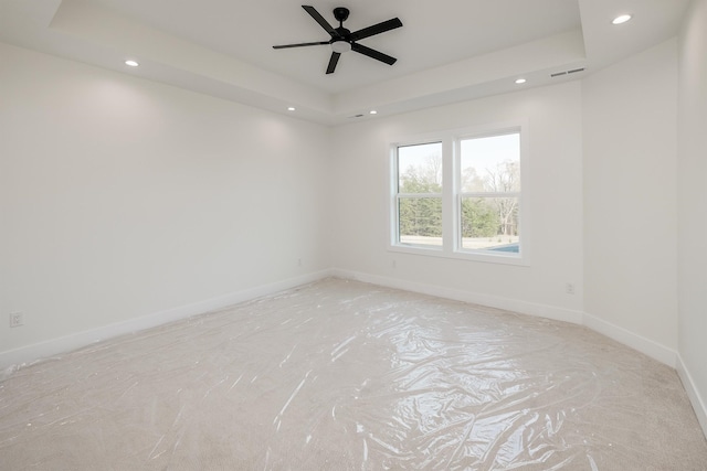 3619 Pennington Rd, Greer, SC 29651 - spare room featuring a raised ceiling, recessed lighting, and ceiling fan
