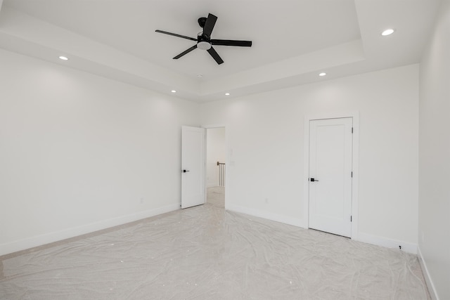3619 Pennington Rd, Greer, SC 29651 - unfurnished room with recessed lighting, a ceiling fan, and a tray ceiling