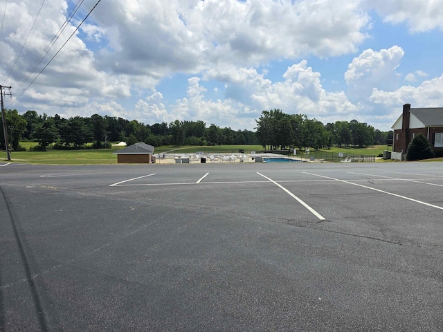 123 Sheraton Loop, Gaffney, SC 29341 - uncovered parking lot featuring view of scattered trees