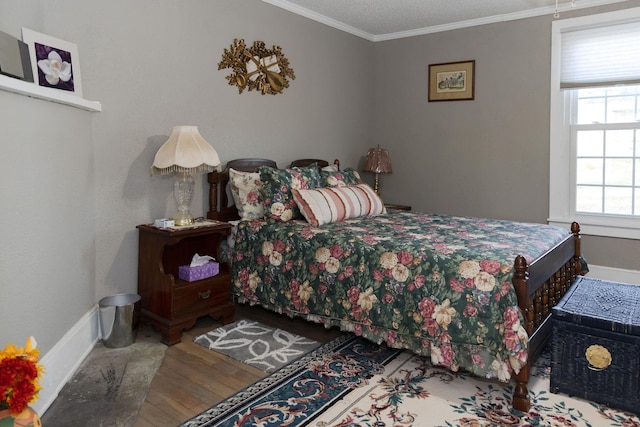 1218 Parker Rd, Enoree, SC 29335 - bedroom with wood finished floors and crown molding