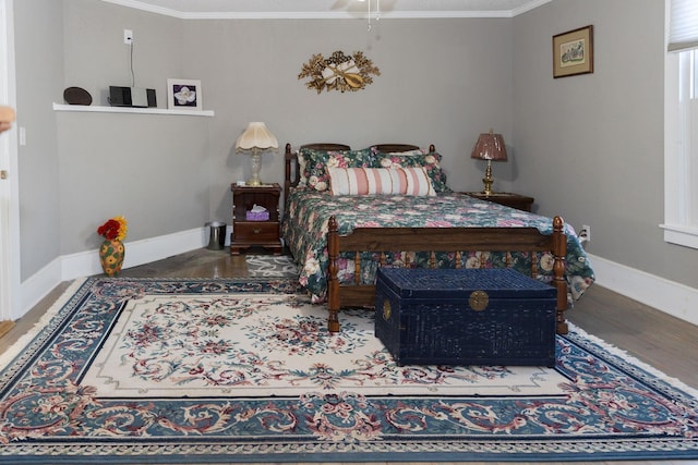 1218 Parker Rd, Enoree, SC 29335 - bedroom featuring wood finished floors and ornamental molding