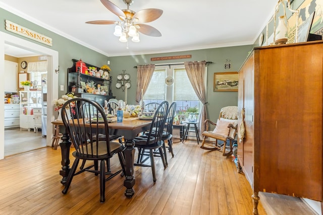 601 Front St, Chesnee, SC 29523 - dining room with a ceiling fan, plenty of natural light, light wood-style floors, and ornamental molding