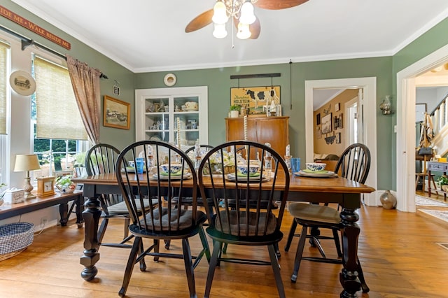601 Front St, Chesnee, SC 29523 - dining room with a ceiling fan, wood finished floors, and crown molding