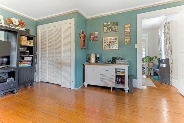 601 Front St, Chesnee, SC 29523 - indoor dry bar featuring light wood-style flooring and ornamental molding