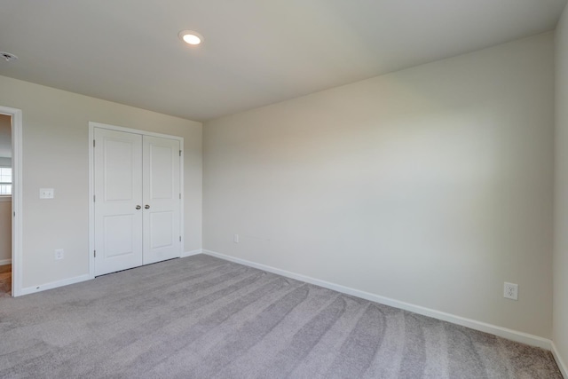 210 Wakelon Dr, Greer, SC 29651 - unfurnished bedroom featuring carpet floors, a closet, and recessed lighting
